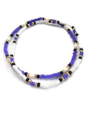 Purple, black, gold, and white stacking stretch anklets. Seed bead elastic cord ankle bracelets. Set of 2.