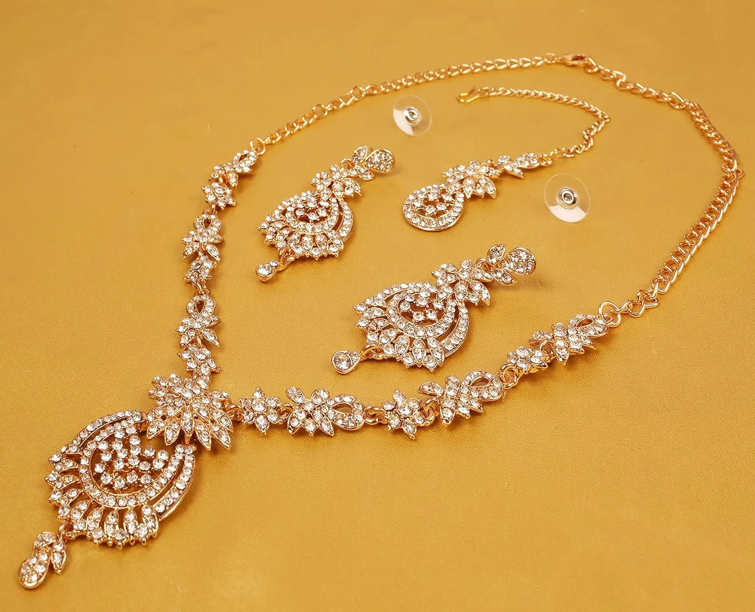 Touchstone Indian Bollywood Gorgeous intricate Workmanship Sparkling Rhinestone crystal wedding Designer Jewelry Necklace Set In Gold or Silver Tone For Women.