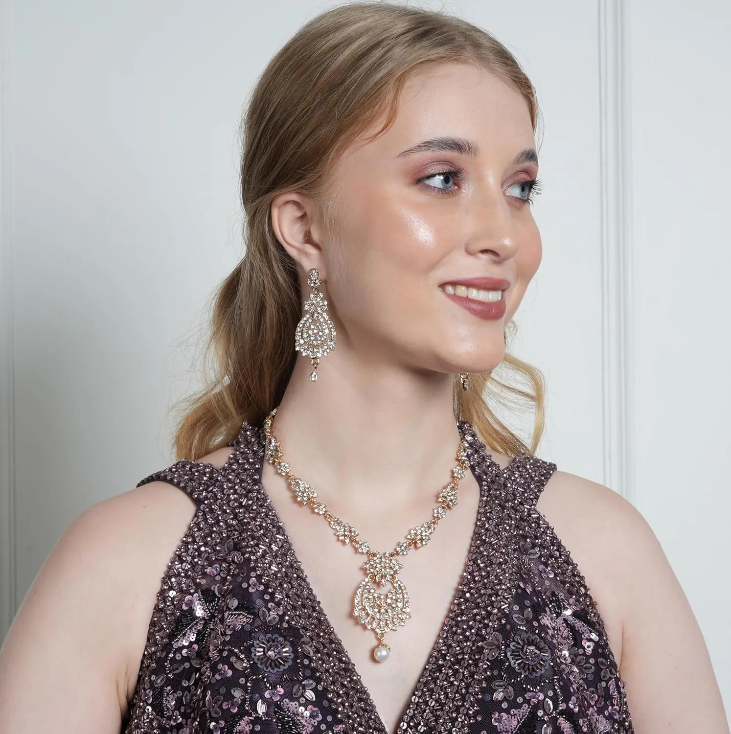 Touchstone Indian Bollywood Gorgeous intricate Workmanship Sparkling Rhinestone crystal wedding Designer Jewelry Necklace Set In Gold or Silver Tone For Women.
