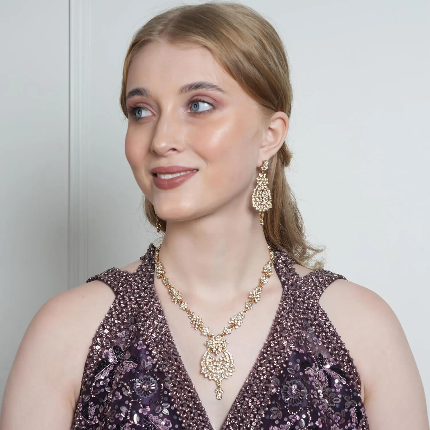 Touchstone Indian Bollywood Gorgeous intricate Workmanship Sparkling Rhinestone crystal wedding Designer Jewelry Necklace Set In Gold or Silver Tone For Women.